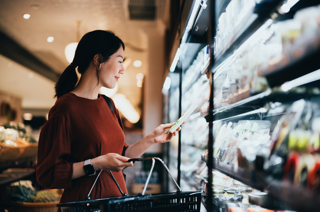 image of a woman shopping in a grocery store